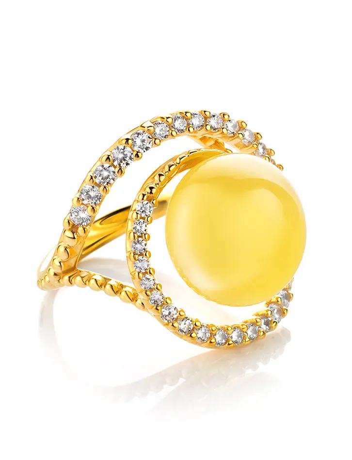 картинка Изящное женственное кольцо из золоченного серебра с янтарём и цирконами «Ривьера» в онлайн магазине