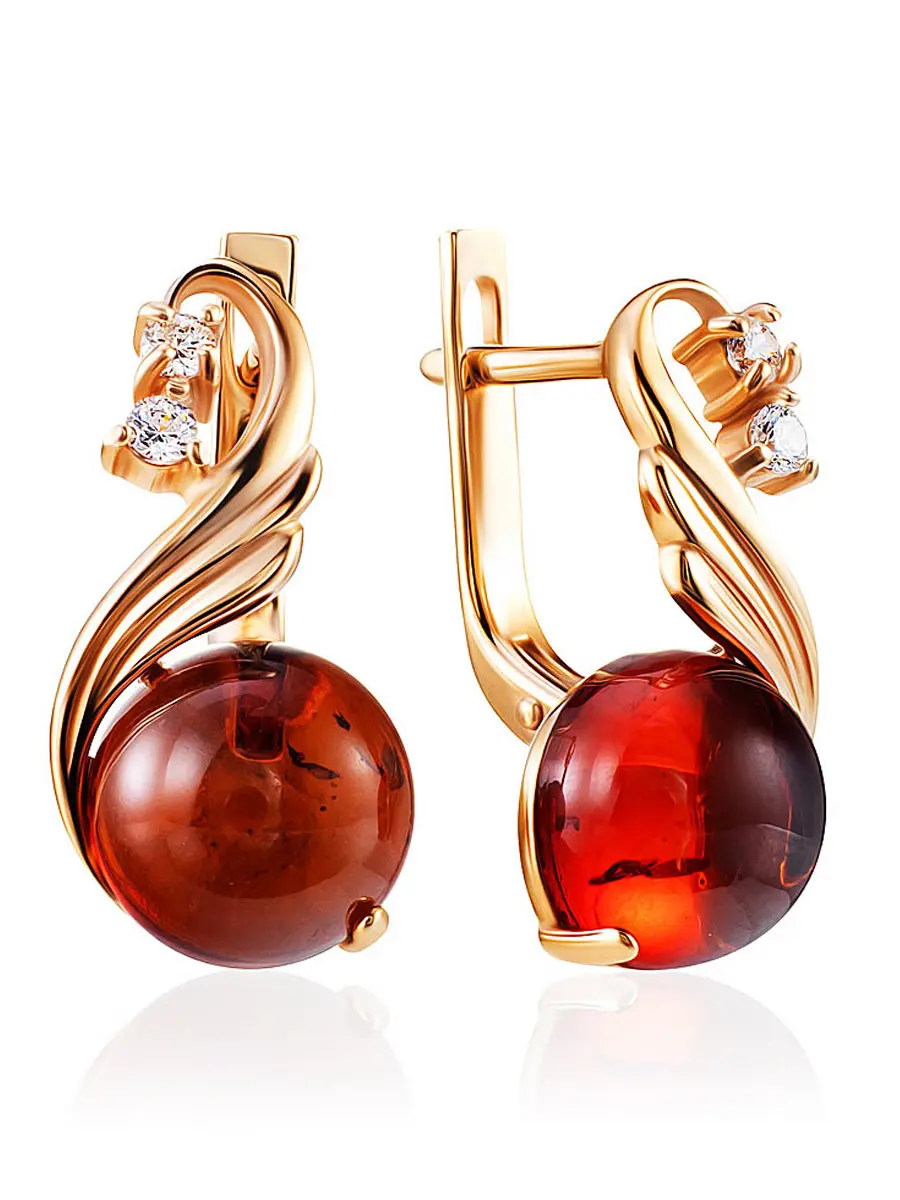 картинка Женственные серьги «Лебедь»  с натуральным коньячным янтарём и фианитами в онлайн магазине