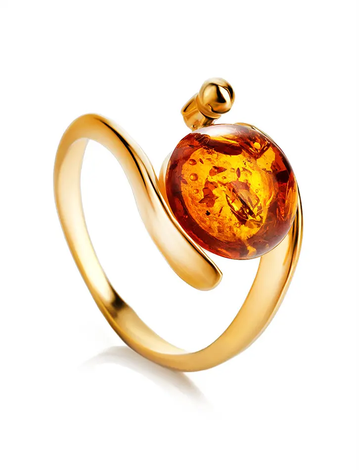 картинка Красивое позолоченное кольцо с натуральным коньячным янтарём «Сфера» в онлайн магазине