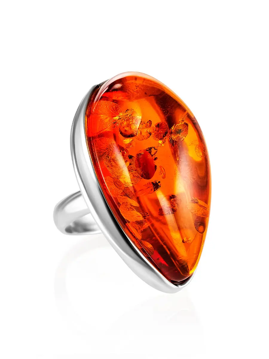 картинка Нарядное кольцо с цельным натуральным янтарем коньячного цвета с искорками «Лагуна» в онлайн магазине