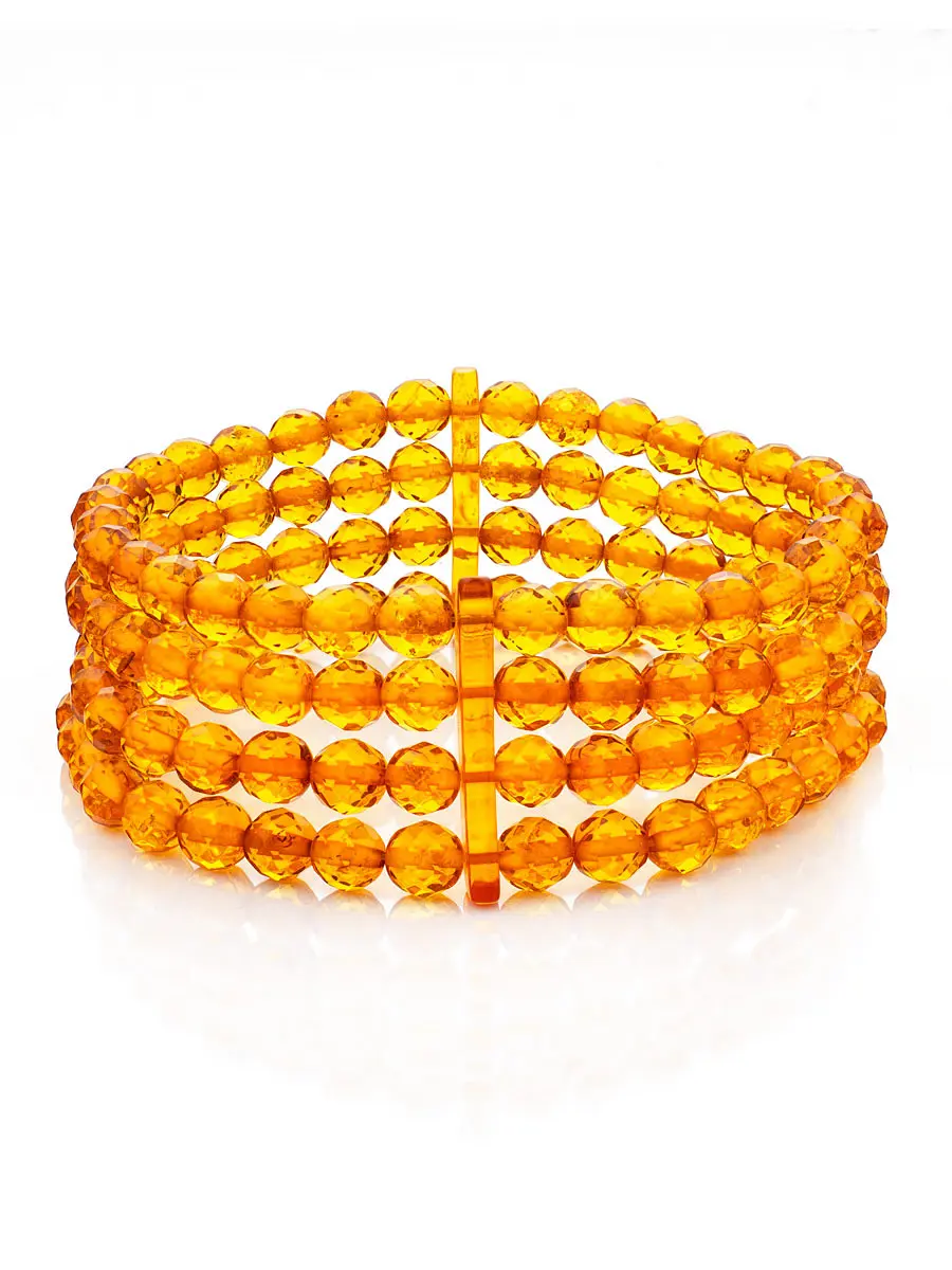 картинка Четырёхрядный браслет из натурального золотистого янтаря «Карамель гранёная» в онлайн магазине