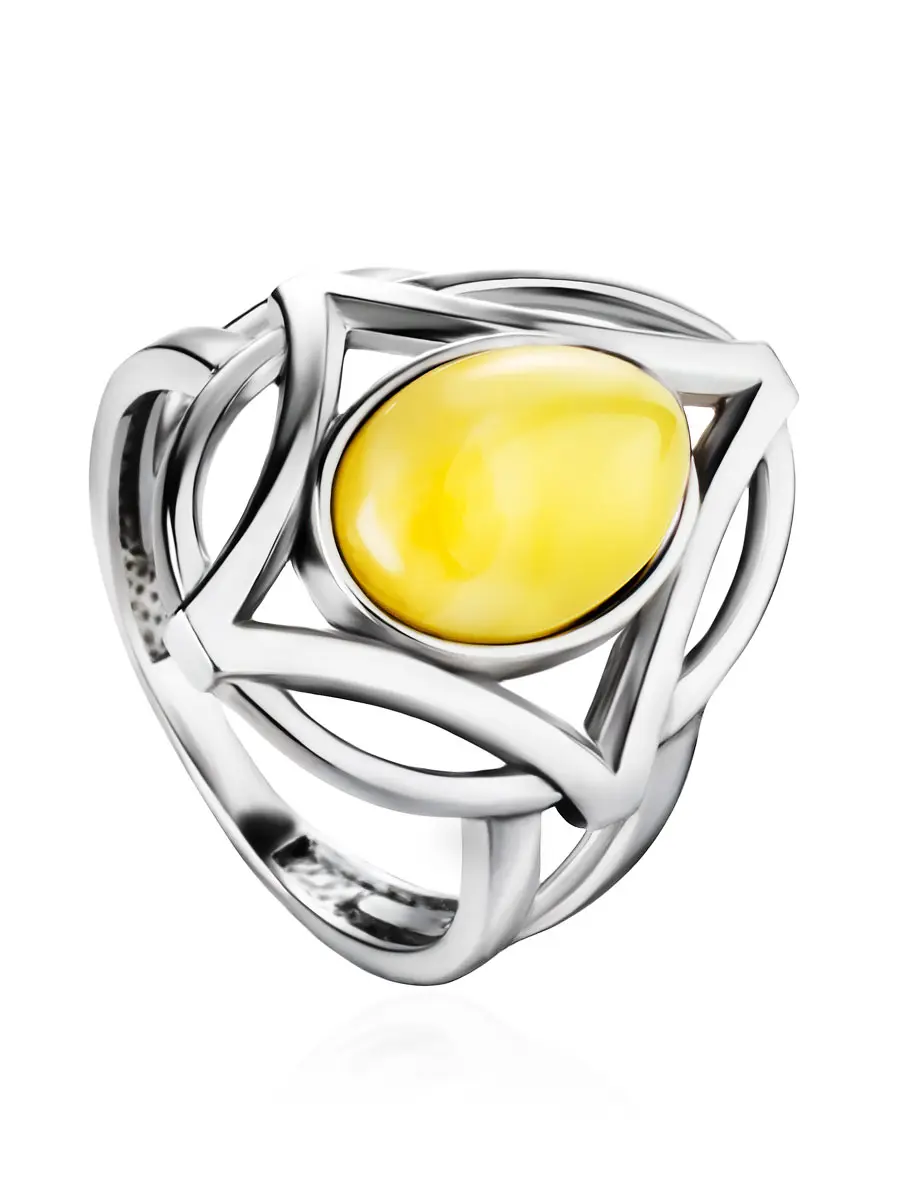 картинка Крупное кольцо «Буссоль» из серебра и натурального янтаря медового цвета в онлайн магазине