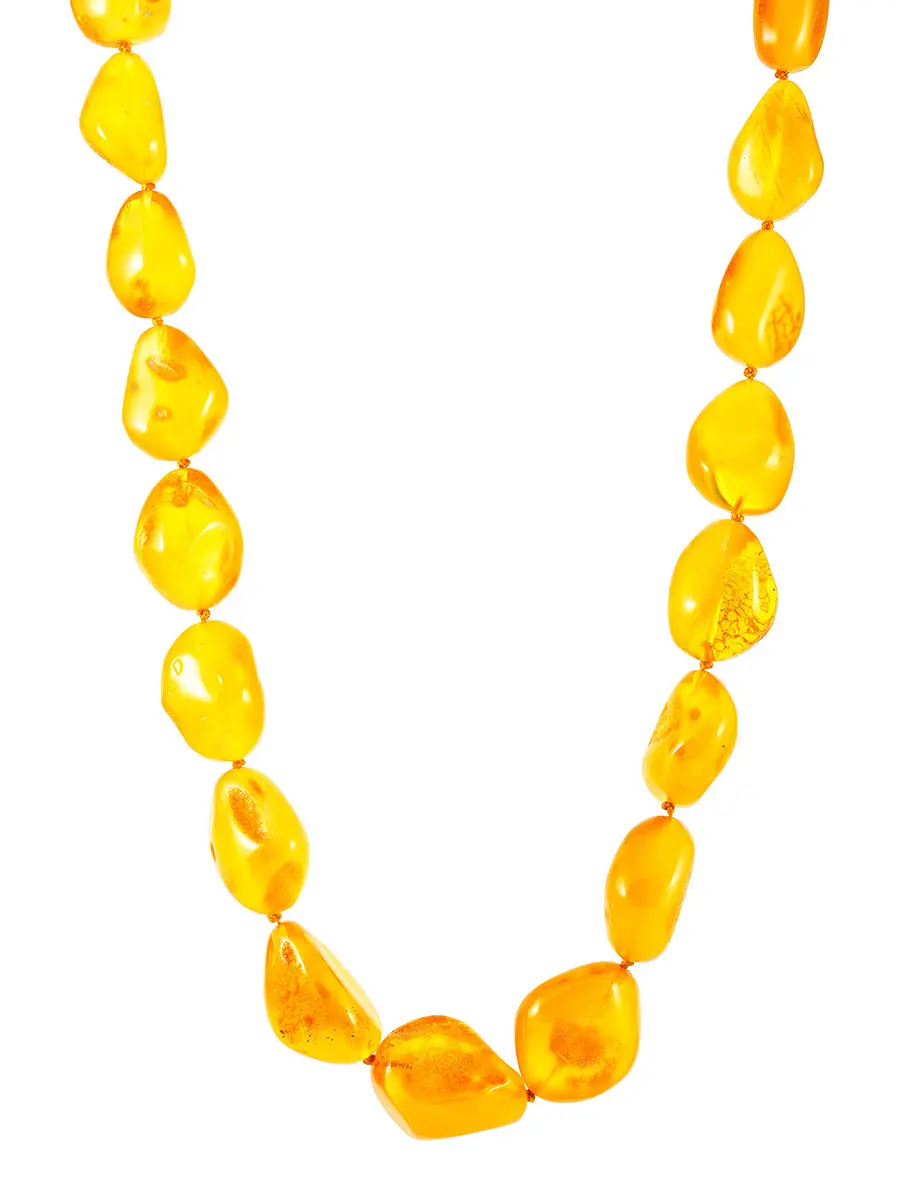 картинка Бусы «Леденцы» из полупрозрачного живописного янтаря тёплого медового цвета в онлайн магазине