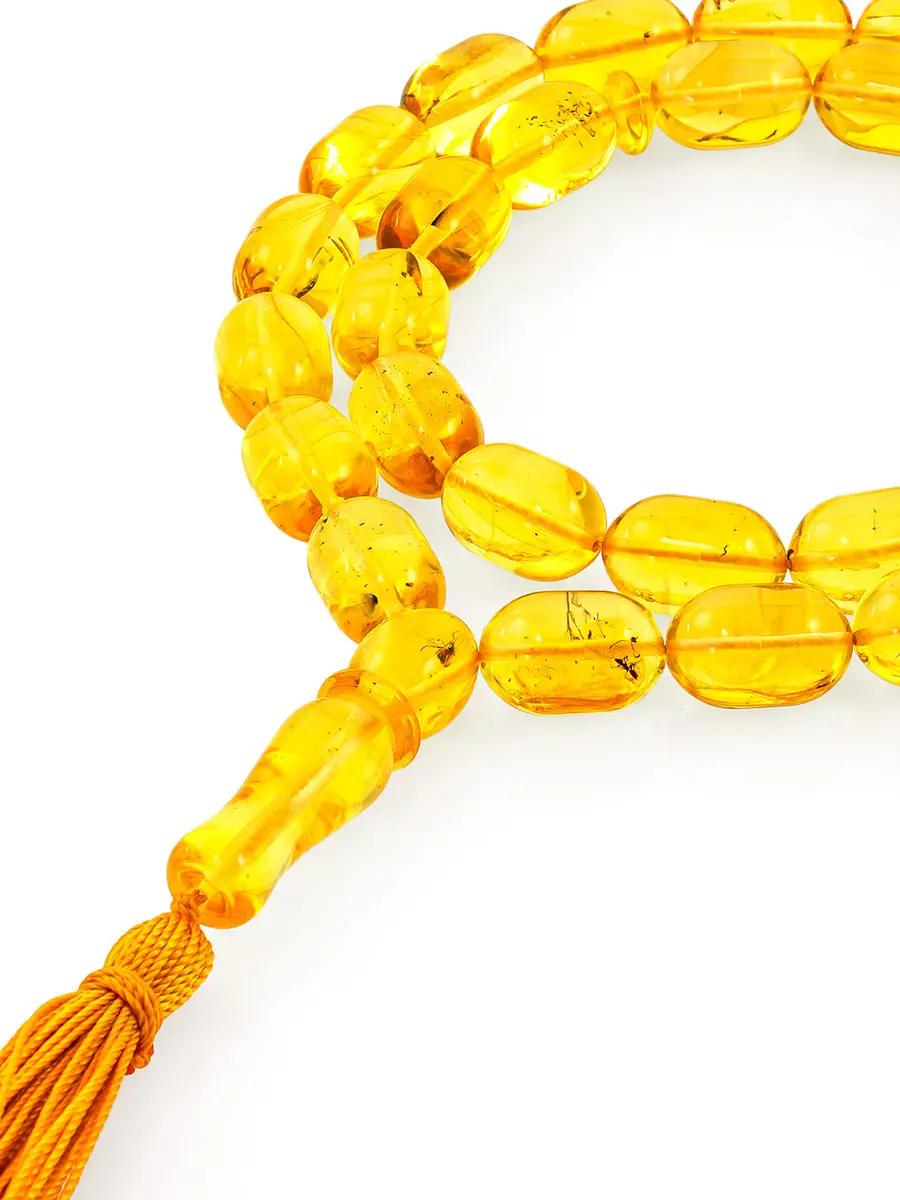 картинка Красивые сияющие чётки из натурального цельного янтаря ярко-лимонного цвета в онлайн магазине