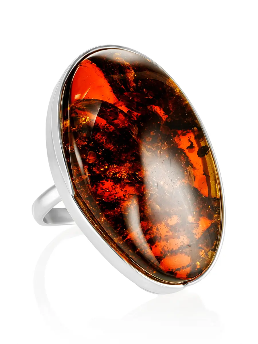 картинка Роскошное объёмное кольцо со вставкой из натурального коньячного янтаря в онлайн магазине