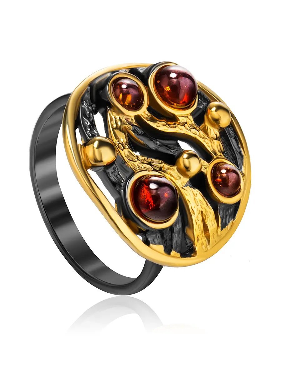 картинка Эффектное кольцо «Плеяда» из серебра с позолотой и натурального янтаря в онлайн магазине
