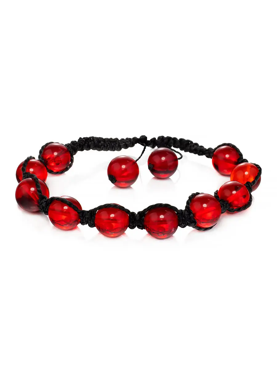 картинка Плетёный браслет из ярко-красных янтарных шаров «Шамбала» в онлайн магазине