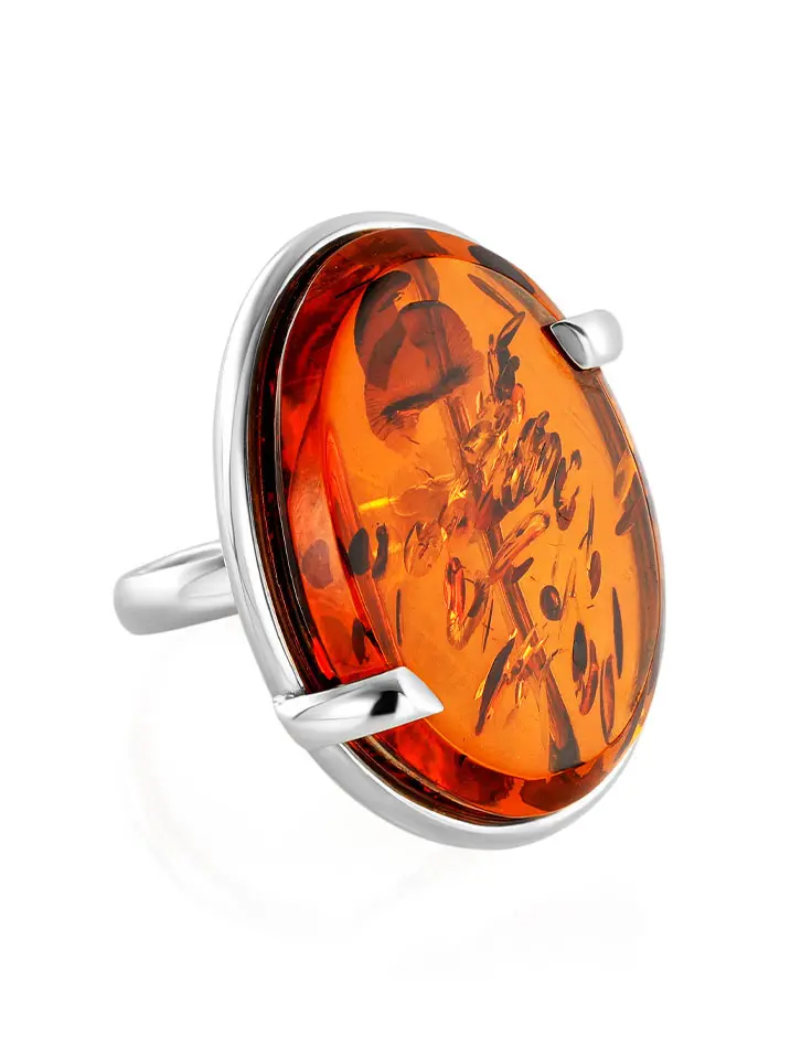 картинка Яркое эффектное серебряное кольцо с крупной вставкой из натурального коньячного янтаря «Глянец» в онлайн магазине
