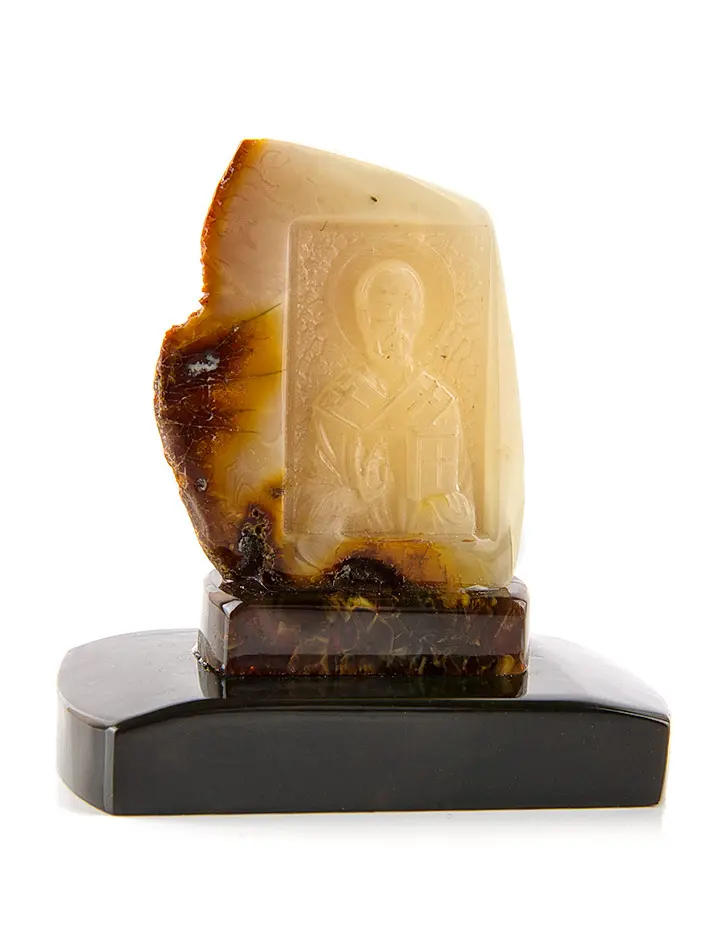 картинка Икона из натурального янтаря с резьбой «Николай Чудотворец» на подставке в онлайн магазине