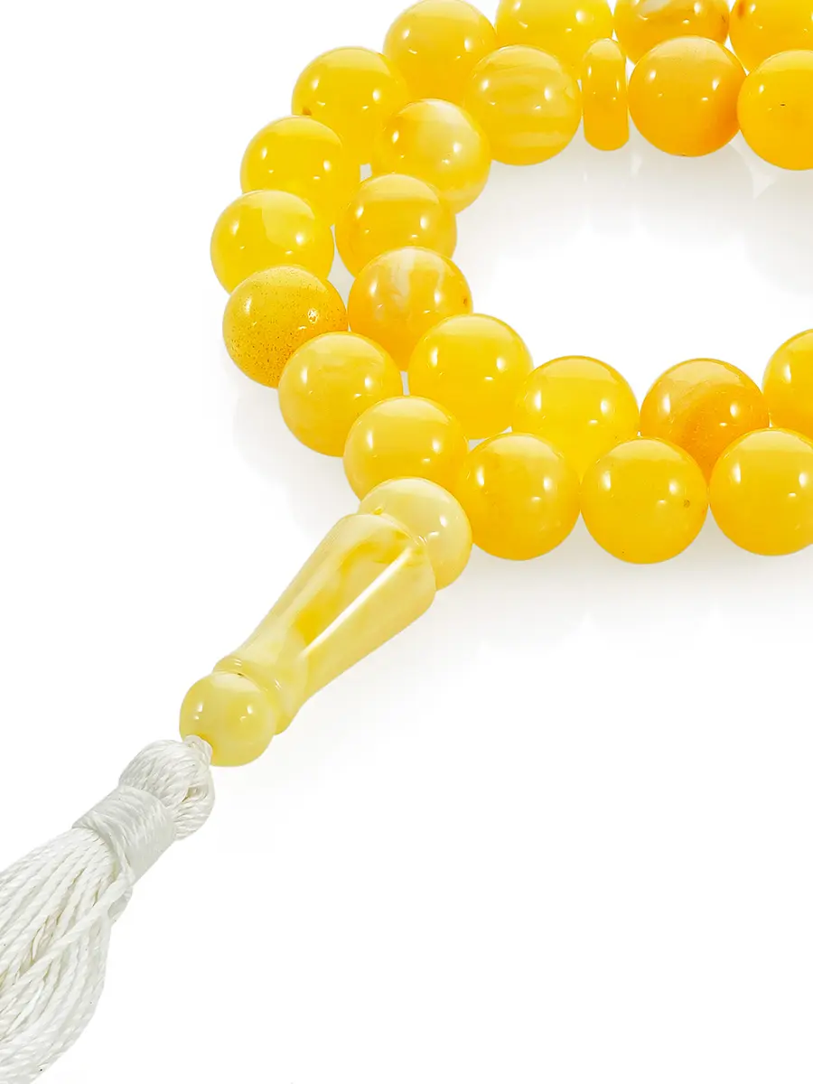 картинка Чётки на 33 бусины из цельного натурального янтаря молочно-медового цвета в онлайн магазине