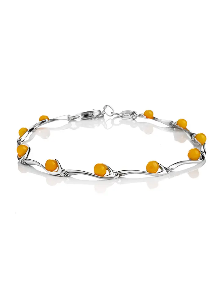 картинка Лёгкий изящный браслет «Лея» из серебра и натурального янтаря медового цвета в онлайн магазине