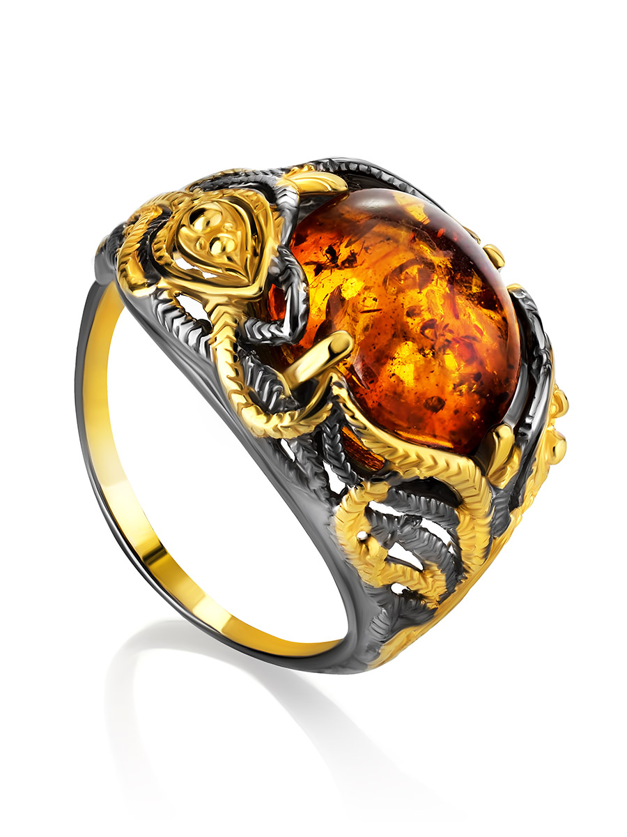 Эффектное ажурное кольцо «Павлин» из серебра с позолотой и натурального янтаря